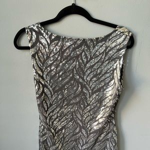 Silver metallic. Stretchy